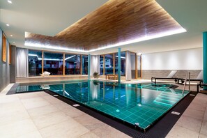 Indoor pool, open 3:00 PM to 9:00 PM, pool loungers
