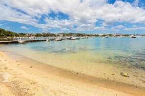 On the beach, white sand, 2 beach bars