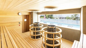 A sauna room with wooden floors and a window overlooking a pool. - KAMOME SLOW HOTEL THE COMPACT (Awaji)