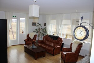 48-inch flat-screen TV with digital channels, TV, DVD player