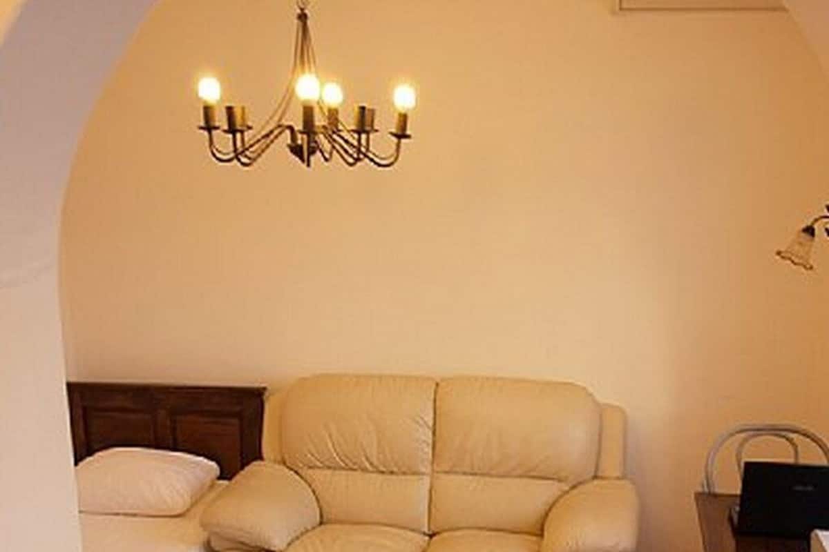 Departamento (One Bedroom Apartment) | Sala de estar | Televisión