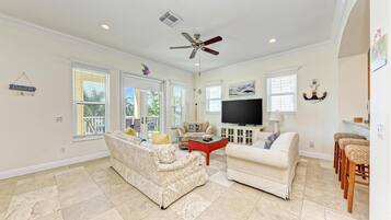 Townhome, Multiple Beds, Pool Access, Pool View | Living area | 40-inch TV with cable channels