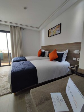 ห้องคอมฟอร์ทดับเบิลหรือทวิน, เตียงเดี่ยว 2 เตียง | เครื่องนอนระดับพรีเมียม, ผ้านวมขนเป็ด, เตียง Select Comfort