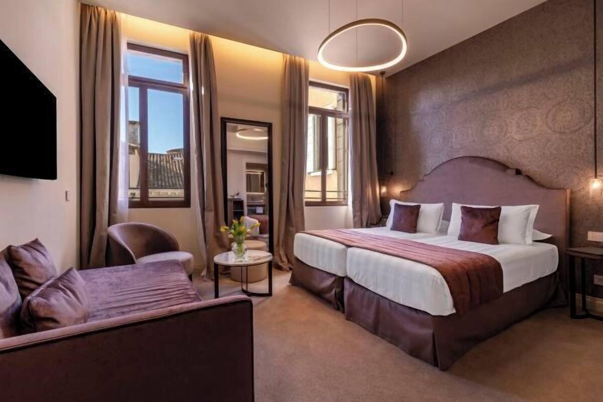 Down comforters, minibar, in-room safe, desk