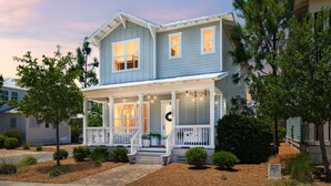 A two-story house with a porch, a front door, and a mailbox. - ☀️ 6 Beds | Golf Cart | Near Beach (Santa Rosa Beach)