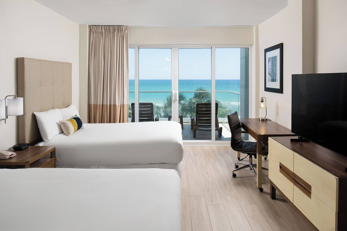 Deluxe Oceanfront Double Beds with Balcony | In-room safe, desk, iron/ironing board, WiFi (free)