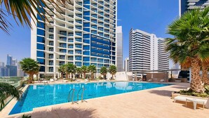 Outdoor pool - Stunning 2BR with Balcony-Canal View (Dubai)