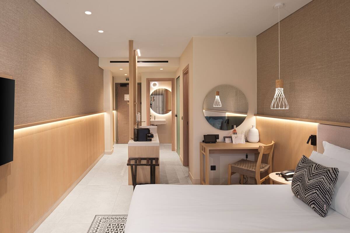 Premium bedding, down duvets, memory-foam beds, in-room safe