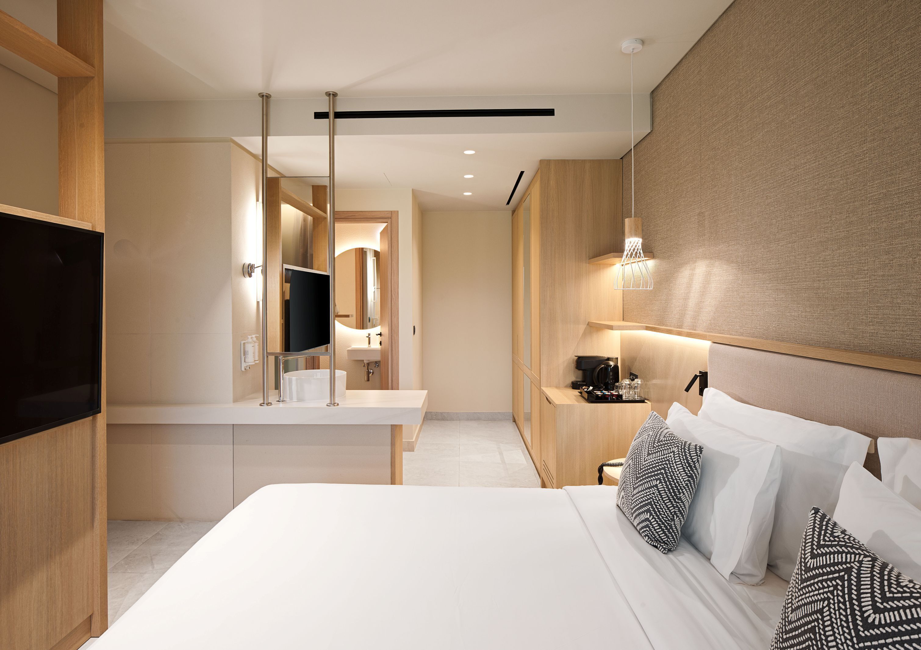 Premium bedding, down comforters, memory foam beds, in-room safe