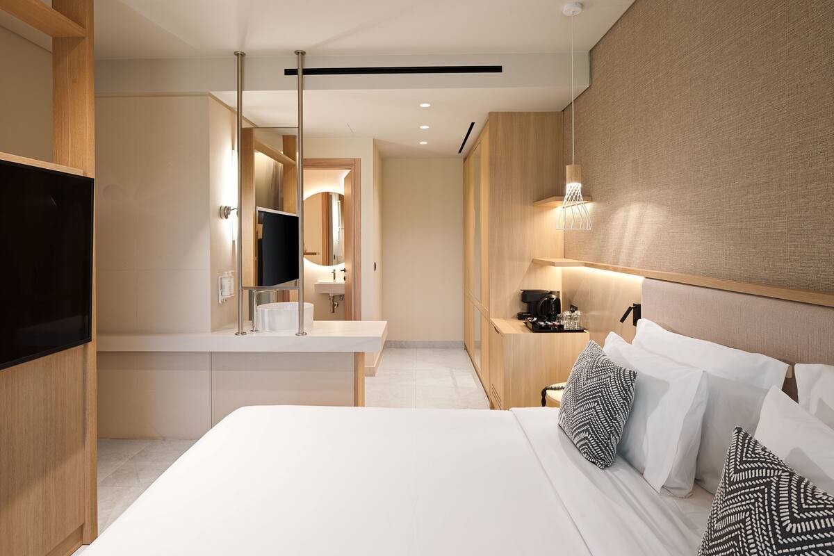 Premium bedding, down duvets, memory-foam beds, in-room safe