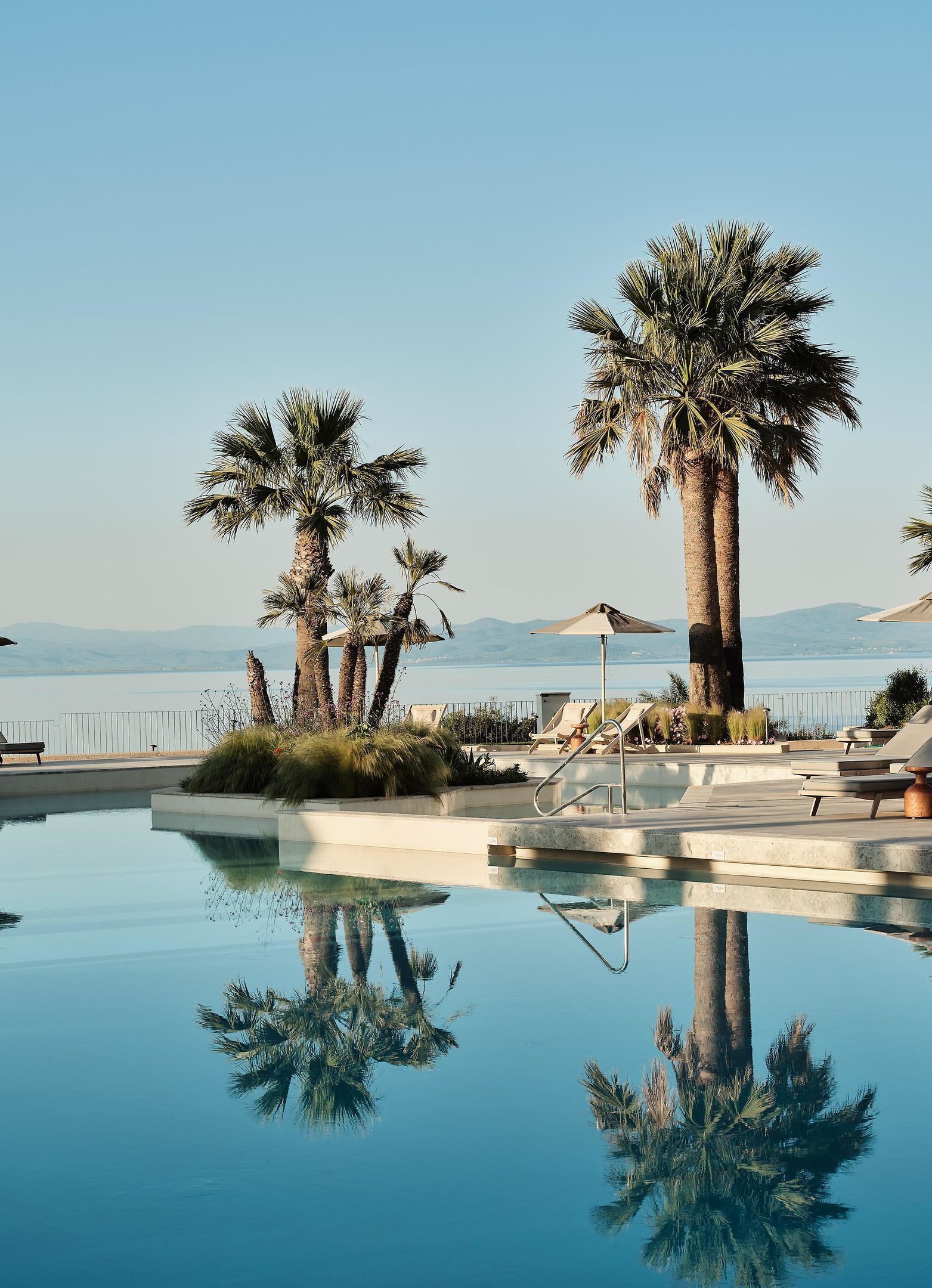 Seasonal outdoor pool, pool umbrellas, sun loungers