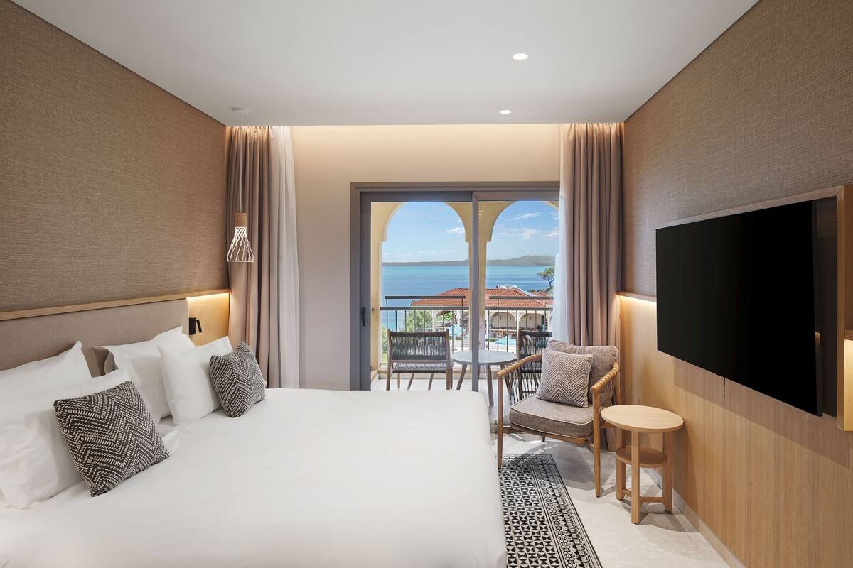 Premium bedding, down duvets, memory-foam beds, in-room safe