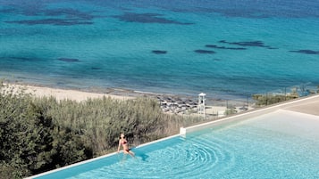 Seasonal outdoor pool, pool umbrellas, sun loungers
