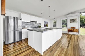 Fridge, microwave, oven, stovetop - The Entertainer | 5 Bed 5 Bath, 3 Storey Retreat (Orange)