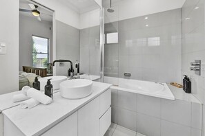 Bathtub, hair dryer, towels