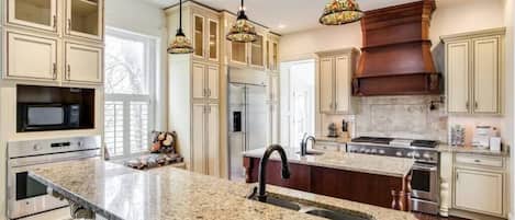Fridge, microwave, oven, cookware/dishes/utensils