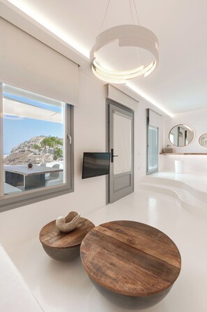 40-inch Smart TV with satellite channels, TV - Nelya Suites (Santorini)