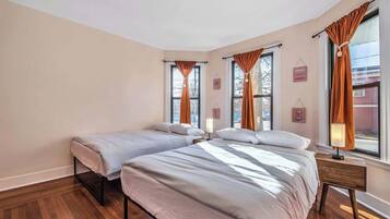 5 bedrooms, memory-foam beds, iron/ironing board, travel cot