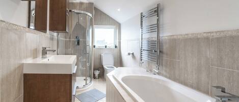 Shower, hair dryer, towels, soap