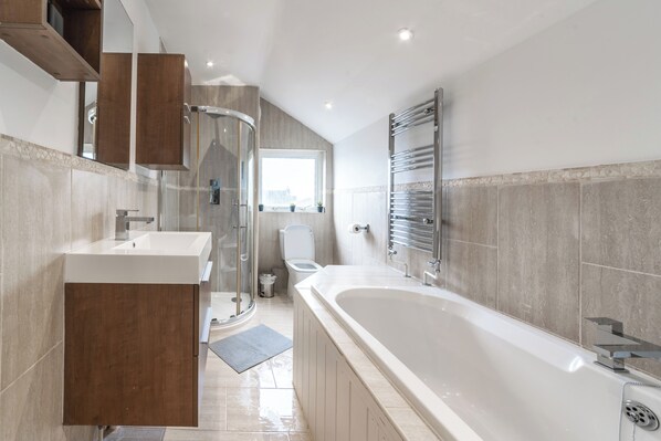 Shower, hair dryer, towels, soap