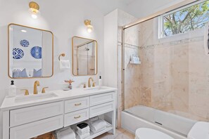 Bathtub, hair dryer, towels