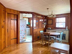 Knotty pine throughout the first floor adds incredible charm!