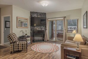 TV, fireplace, books, offices