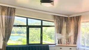 Deluxe Triple Room | Memory foam beds, minibar, desk, laptop workspace