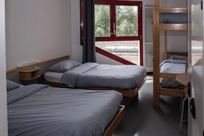 Blackout curtains, iron/ironing board, free WiFi, bed sheets