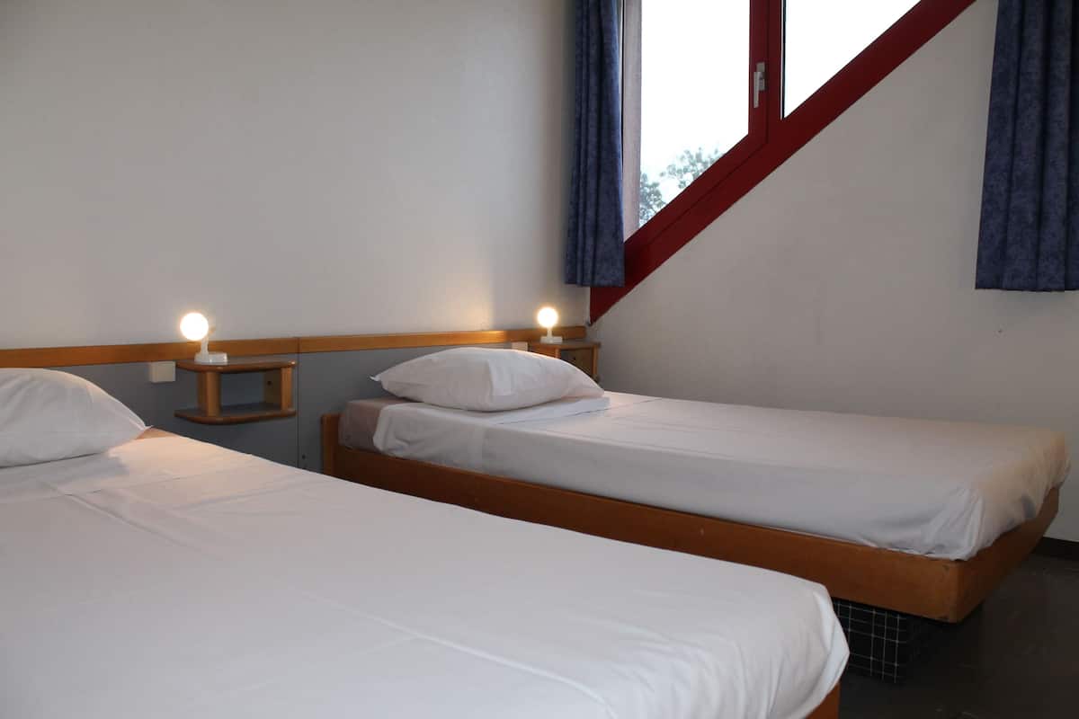 Blackout drapes, iron/ironing board, free WiFi, bed sheets