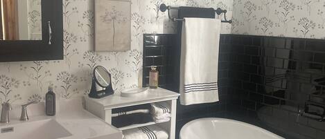 Shower, towels, soap, shampoo