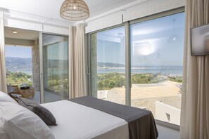 2 dormitorios, caja fuerte, tabla de planchar con plancha