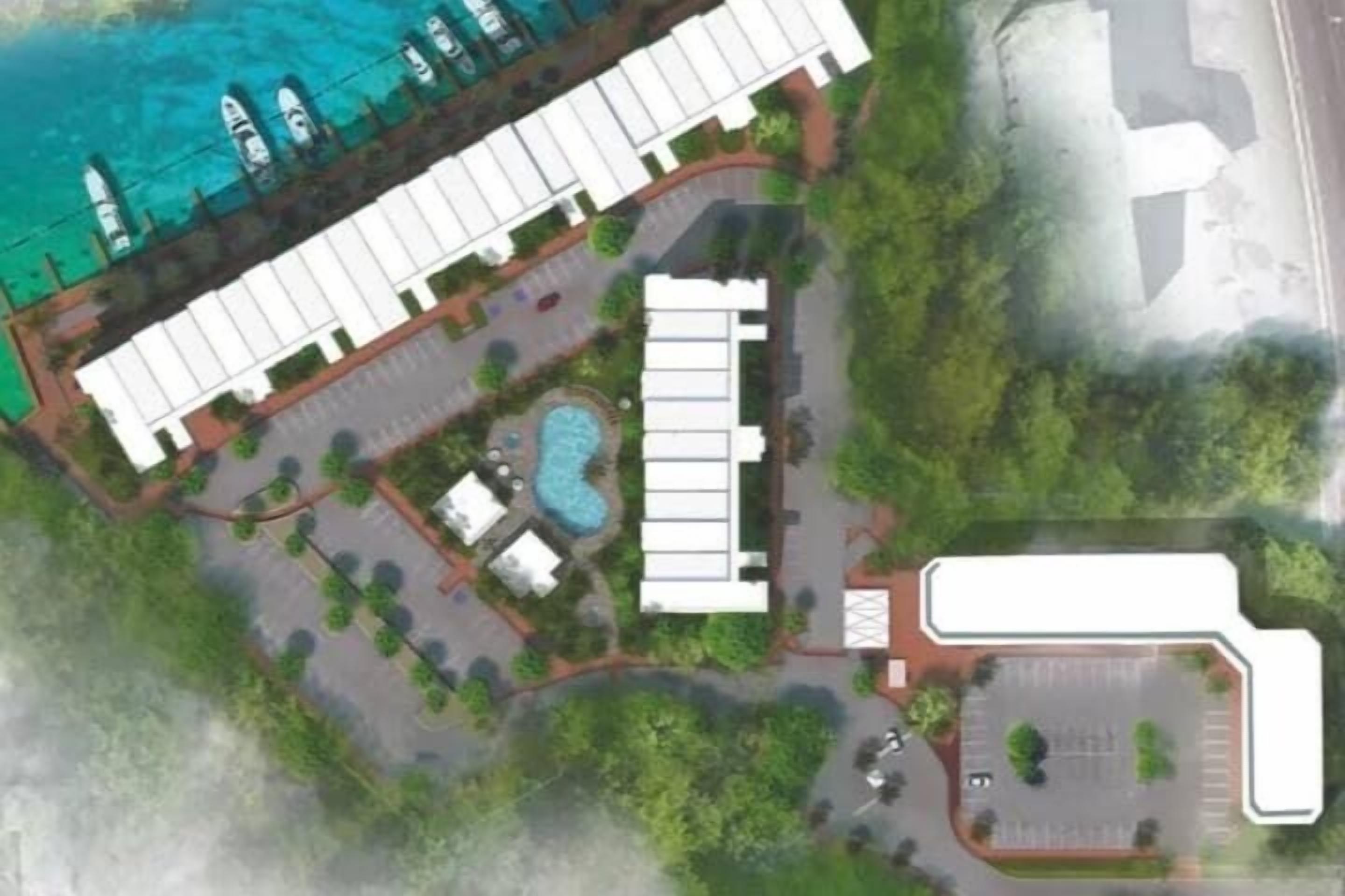 A hotel layout with a swimming pool, multiple guest rooms, and a parking area.