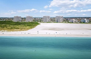On the beach, sun-loungers, beach towels