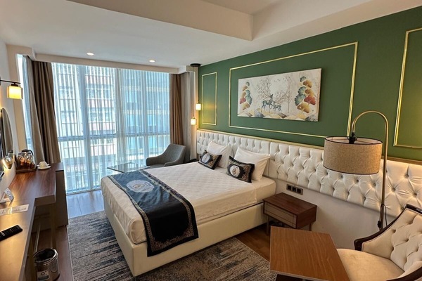 Chambre Double Deluxe | Draps en coton égyptien, literie de qualité supérieure