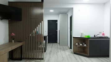 Suite familiar | Escritorio, insonorización, wifi gratis y ropa de cama