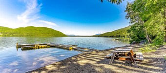 Roomy condo with deck, pool, beach, & wood finishes- near skiing & fishing