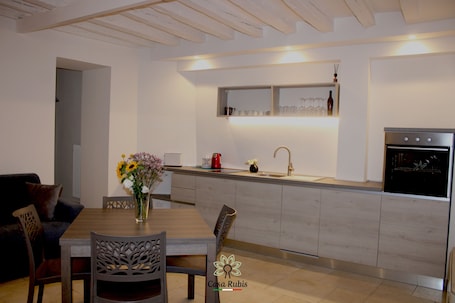 Family Townhome | Private kitchen | Electric kettle, highchair. CASA DEGLI AMICI