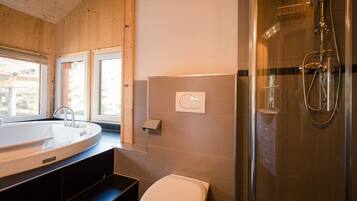 Bathtub, hair dryer, towels