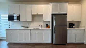 Fridge, microwave, coffee/tea maker, toaster