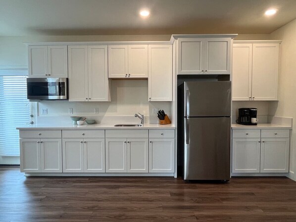 Fridge, microwave, coffee/tea maker, toaster