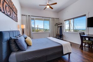 1 bedroom, desk, iron/ironing board, travel crib