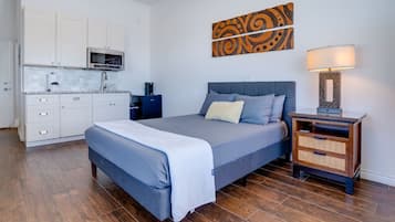 1 bedroom, desk, iron/ironing board, travel crib