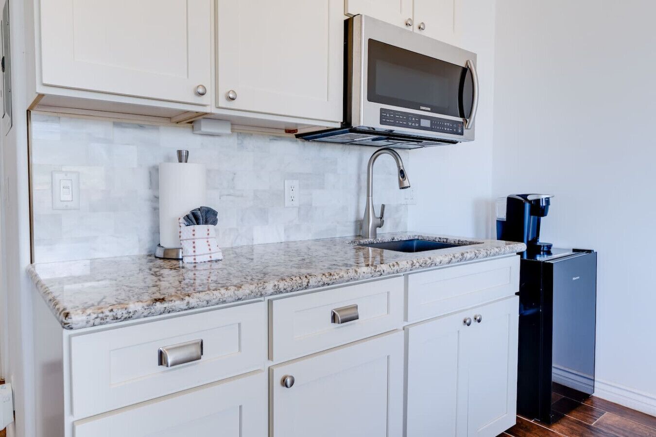 Fridge, microwave, coffee/tea maker, toaster