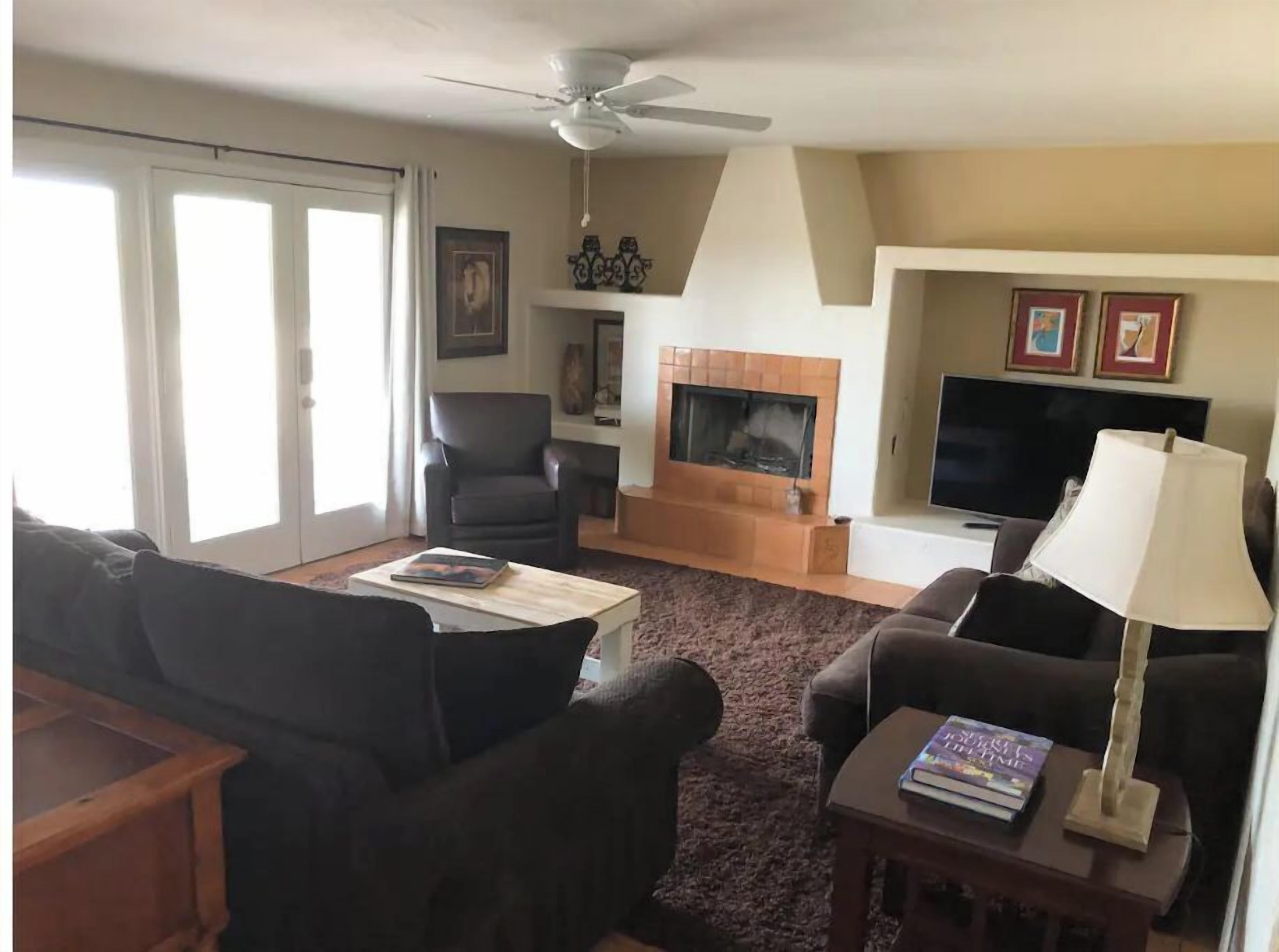 living room w wood burning fireplace