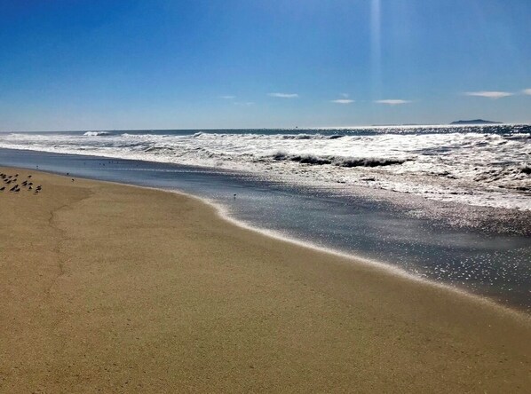 Ligstoelen aan het strand, strandlakens