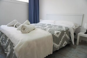 2 dormitorios, tabla de planchar con plancha, wifi gratis y ropa de cama