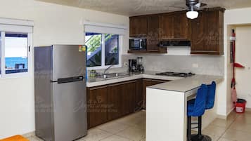 Microwave, stovetop, coffee/tea maker, toaster