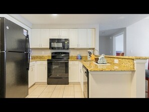 Fridge, microwave, oven, stovetop - 3BD/Daytona - Slide, Pools, Lazy River, Bar, Beach (Daytona Beach)
