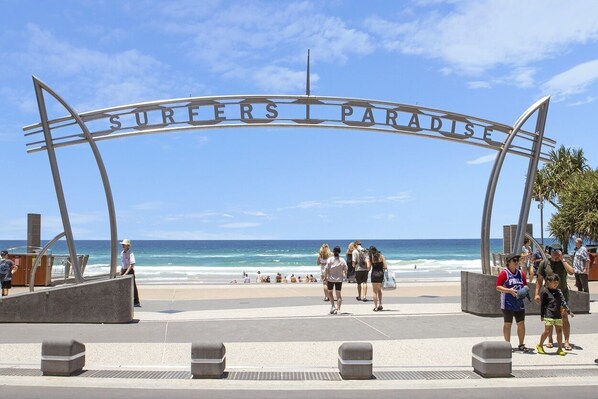 Welcome to Surfers Paradise, where the beach beckons with its inviting shores.